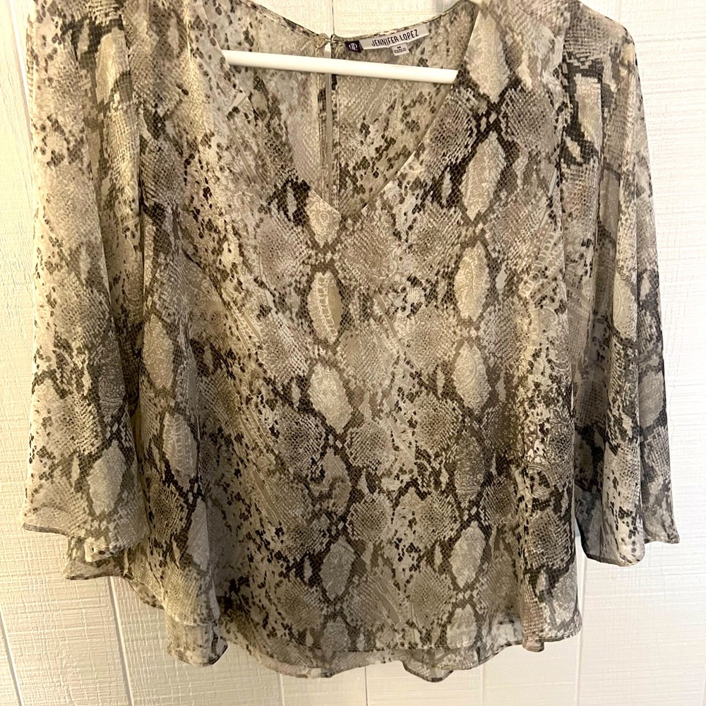 Jennifer Lopez snake print blouse